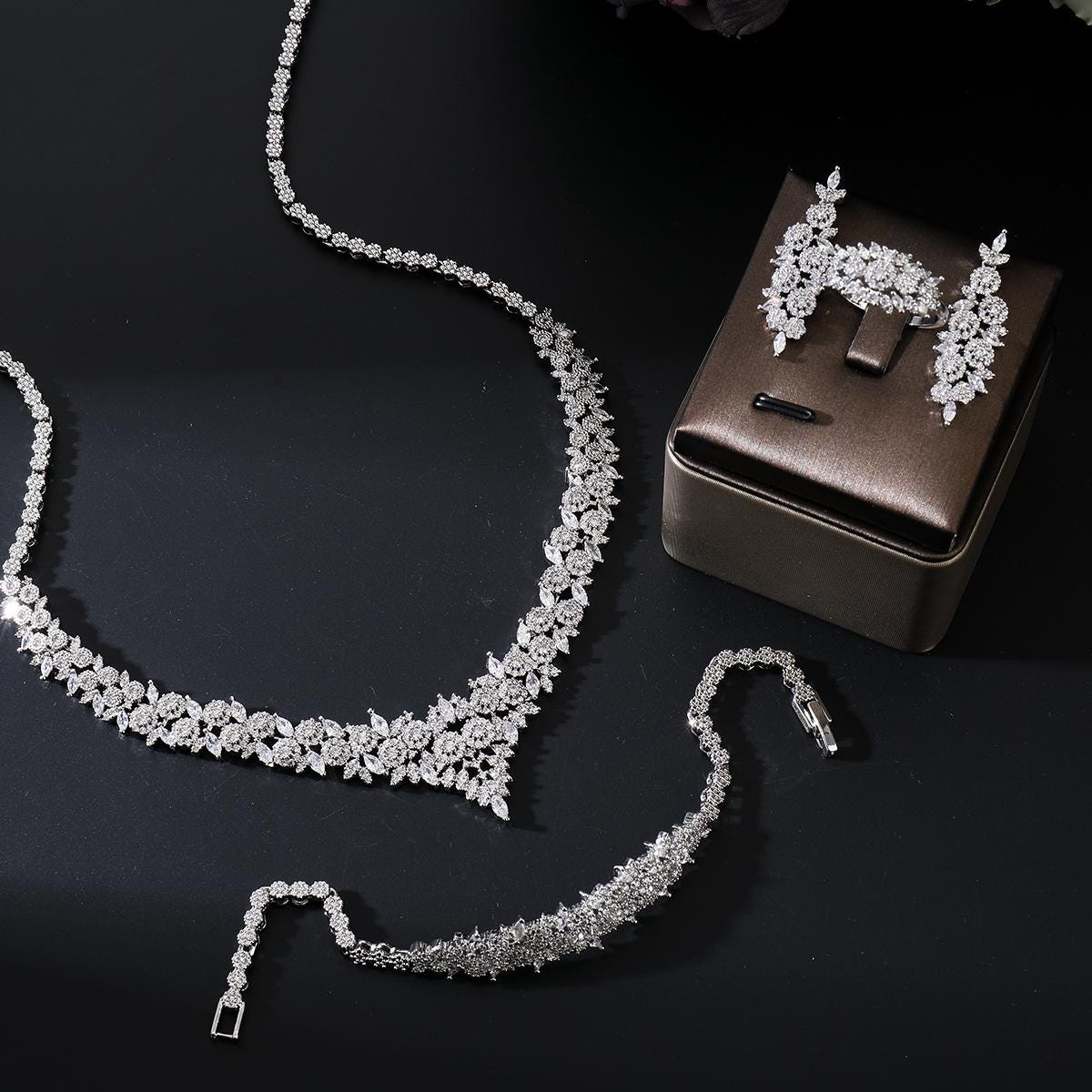 Seraphine Luxe Jewelry Set – Platinum-Plated Necklace, Earrings, Bracelet & Ring with Sparkling Zircon Stones